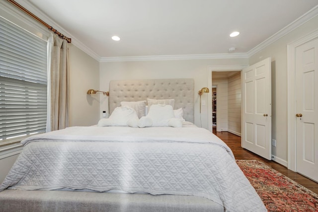 bedroom featuring ornamental molding and dark wood-type flooring