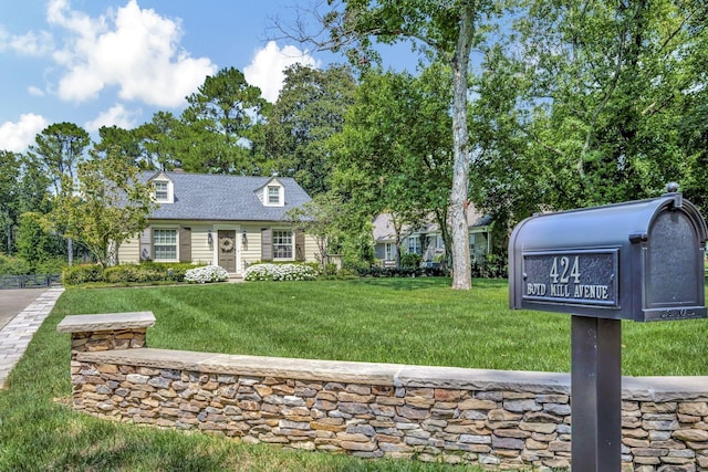 exterior space featuring a front yard