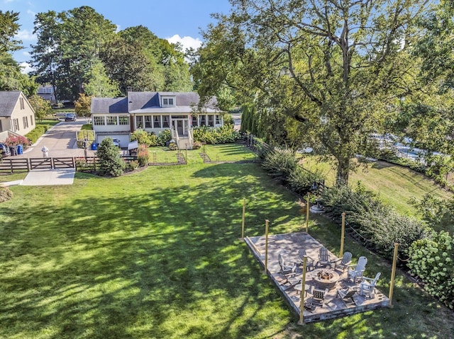 view of yard with a patio and a fire pit