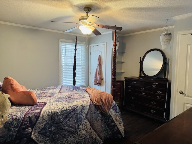 bedroom featuring ceiling fan, ornamental molding, and a textured ceiling