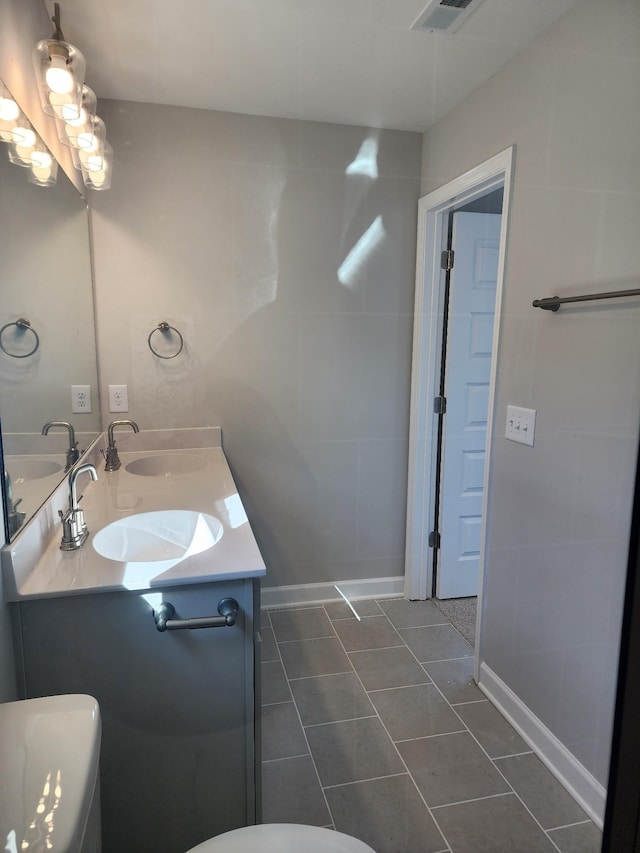 bathroom featuring vanity and tile patterned floors