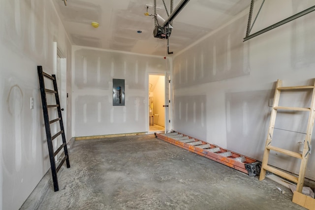 garage featuring a garage door opener and electric panel