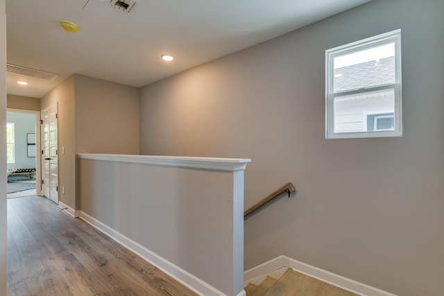 hallway featuring hardwood / wood-style floors