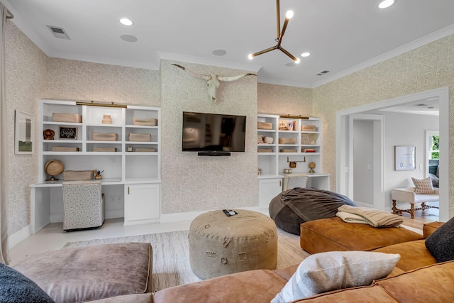 living room featuring crown molding and a chandelier