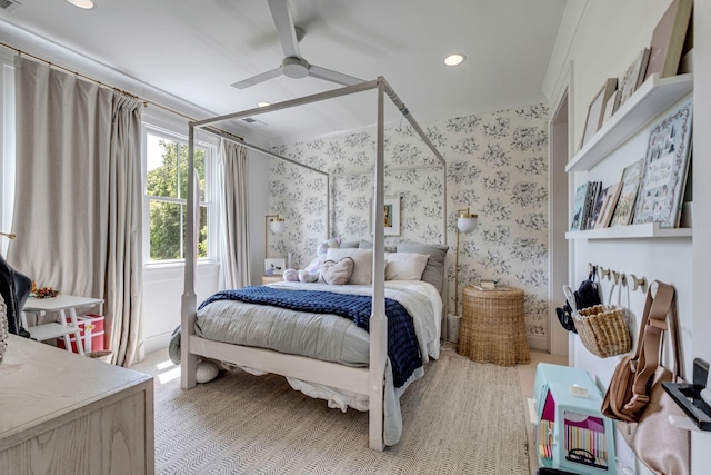 bedroom featuring ceiling fan and ornamental molding