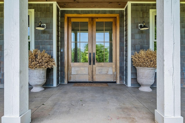 entrance to property featuring french doors