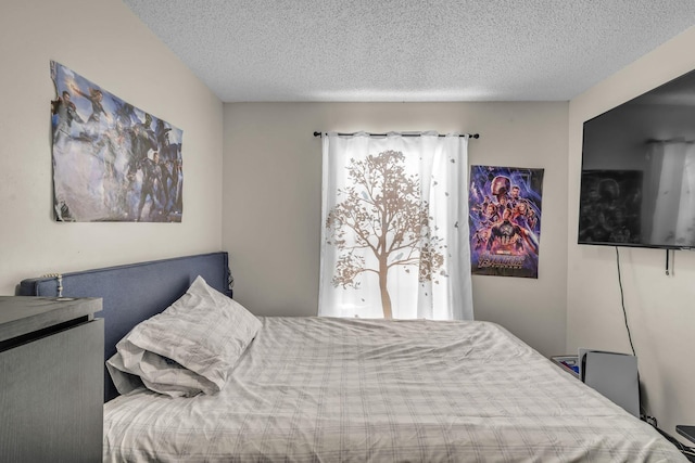 bedroom featuring a textured ceiling