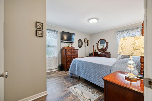 bedroom featuring dark hardwood / wood-style floors