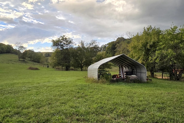 view of yard with a carport