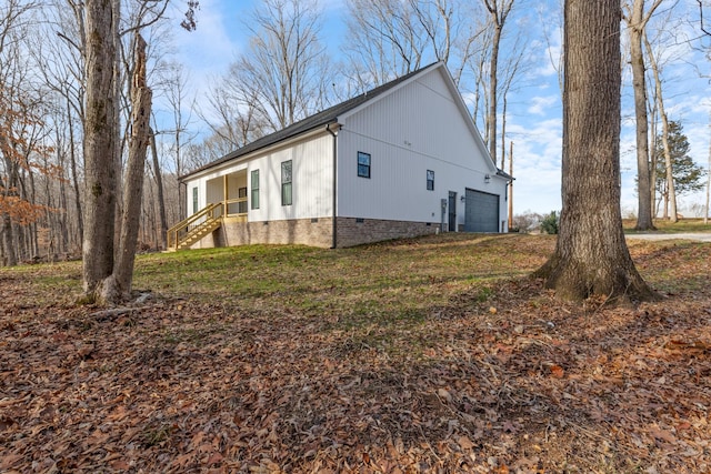 view of property exterior featuring a garage