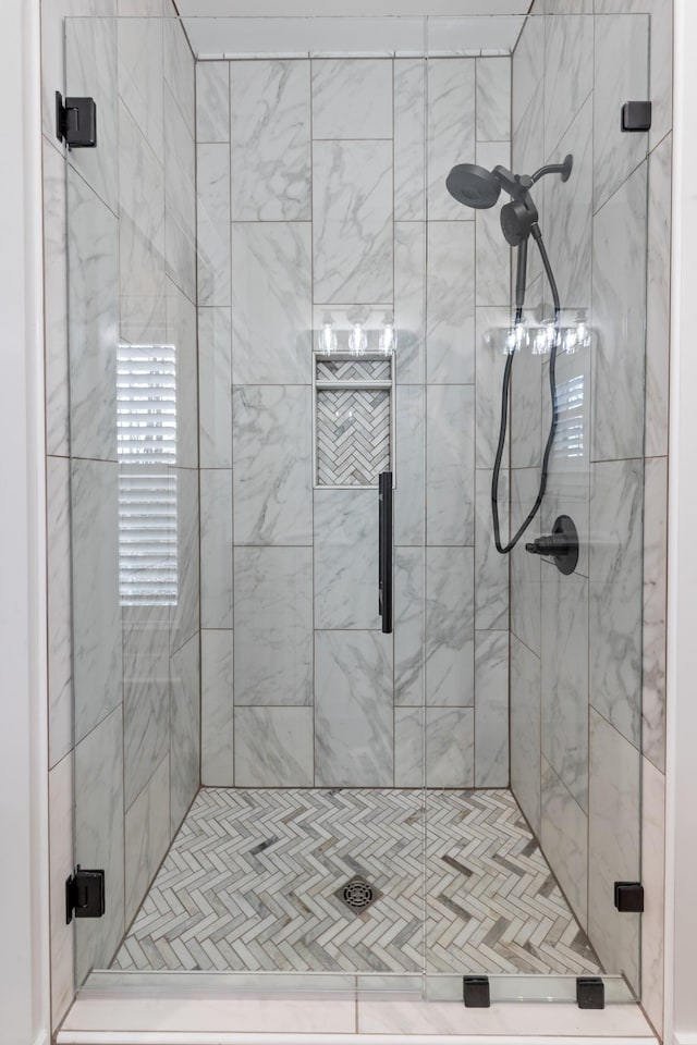 bathroom with an enclosed shower