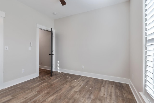 unfurnished room featuring hardwood / wood-style floors