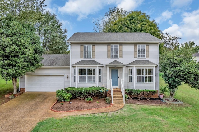 colonial-style house with a garage and a front lawn