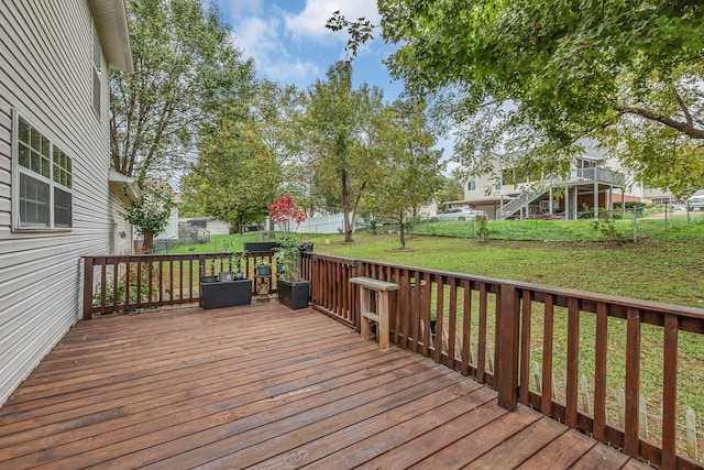 deck featuring a lawn