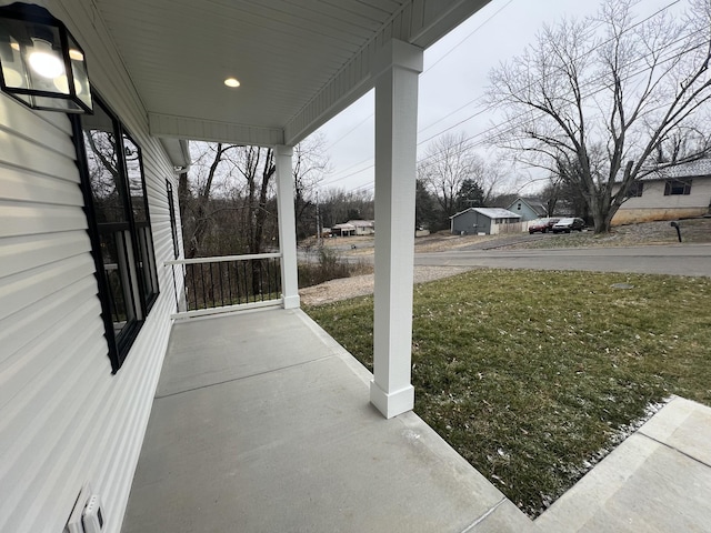 view of patio featuring covered porch