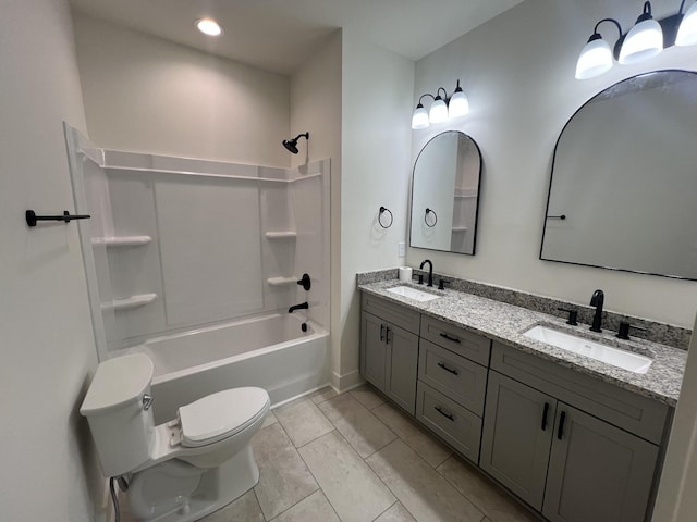 full bathroom with tile patterned flooring, vanity, shower / bathtub combination, and toilet