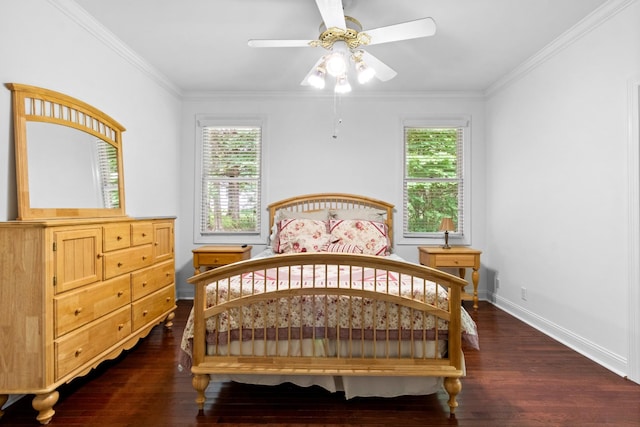 bedroom featuring ceiling fan, crown molding, and dark hardwood / wood-style floors