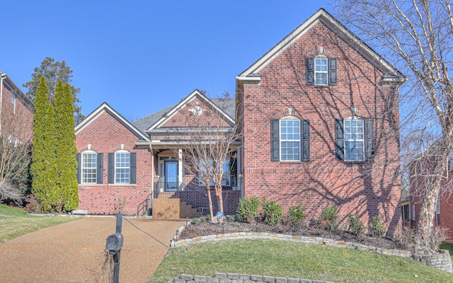 view of front property featuring a front yard