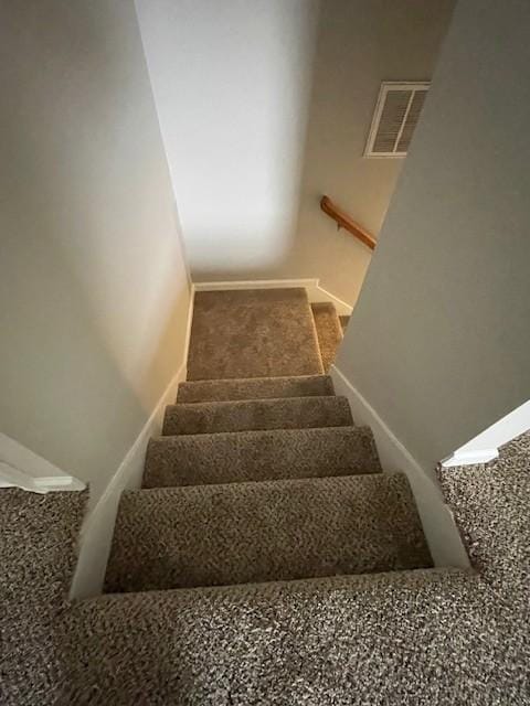 stairs with carpet floors