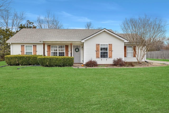 ranch-style house with a front lawn