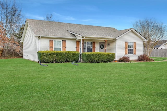 single story home with a front yard