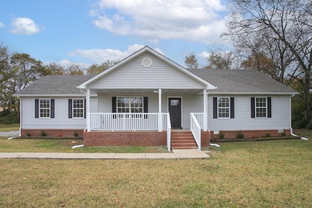 single story home with a front lawn and covered porch