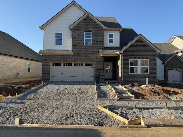 view of front of property with a garage