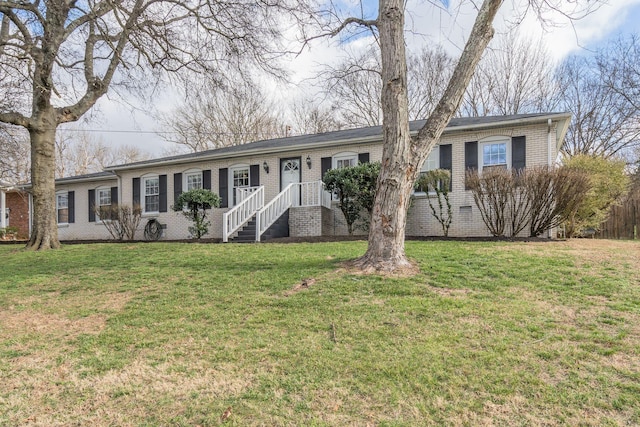 single story home with a front yard