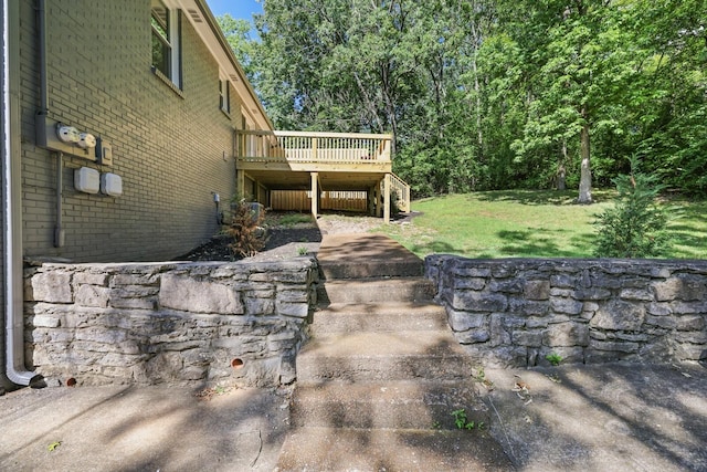 view of yard with a wooden deck