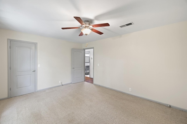 unfurnished room with ceiling fan