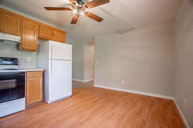 kitchen featuring ceiling fan, light wood-type flooring, and white appliances