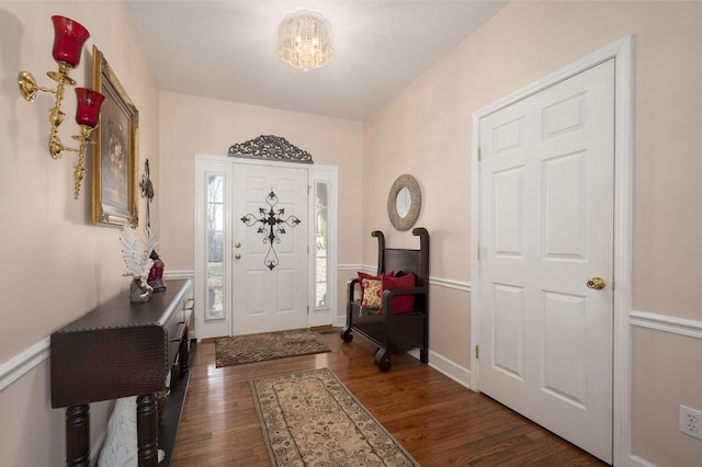 entrance foyer featuring dark hardwood / wood-style floors