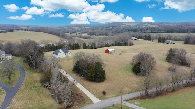 aerial view featuring a mountain view and a rural view