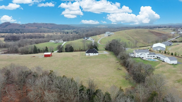 aerial view featuring a mountain view and a rural view