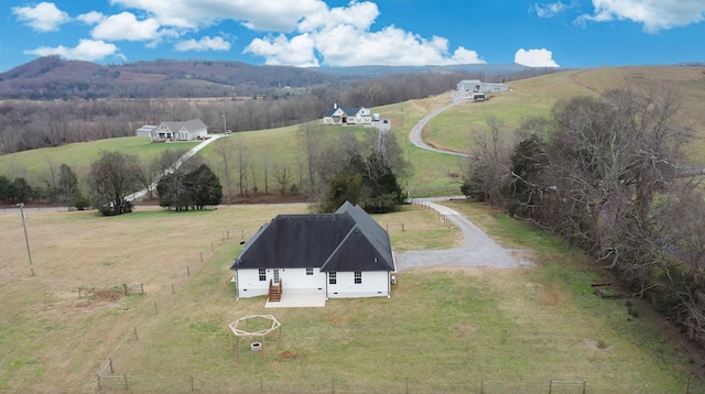 aerial view with a mountain view and a rural view