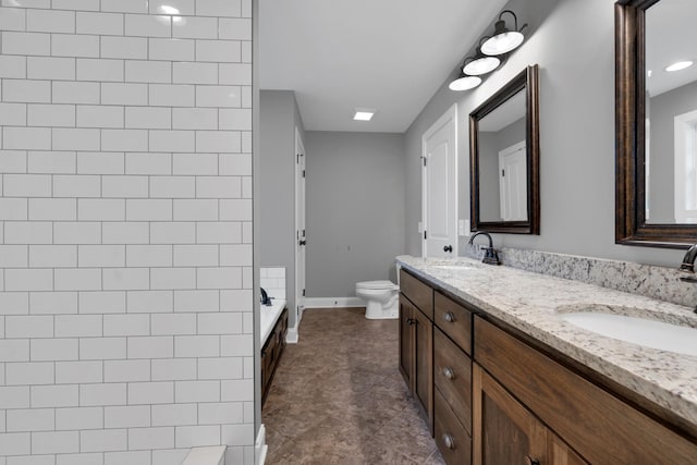 full bathroom with vanity, shower with separate bathtub, and toilet