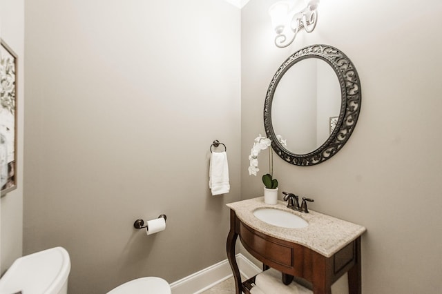 bathroom with toilet and sink