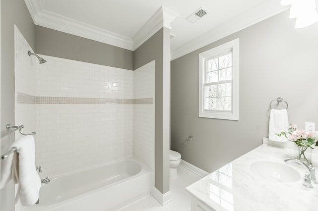 full bathroom featuring vanity, toilet, tiled shower / bath, and ornamental molding