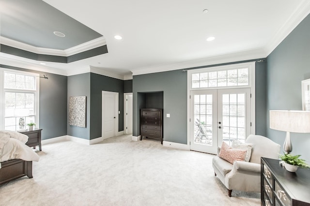 bedroom with access to outside, french doors, light colored carpet, and ornamental molding