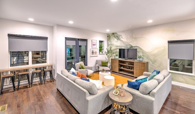 living room featuring dark hardwood / wood-style flooring