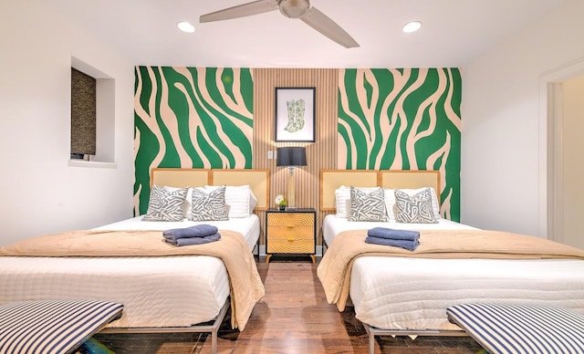 bedroom featuring ceiling fan and hardwood / wood-style floors