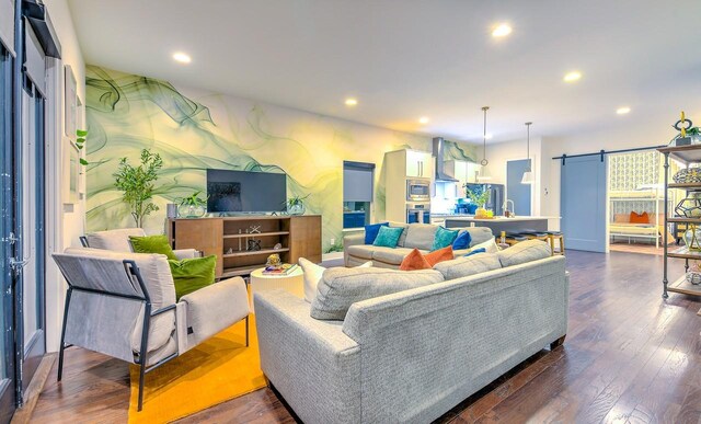 living room with sink and dark hardwood / wood-style flooring