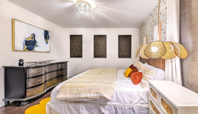 bedroom featuring dark wood-type flooring