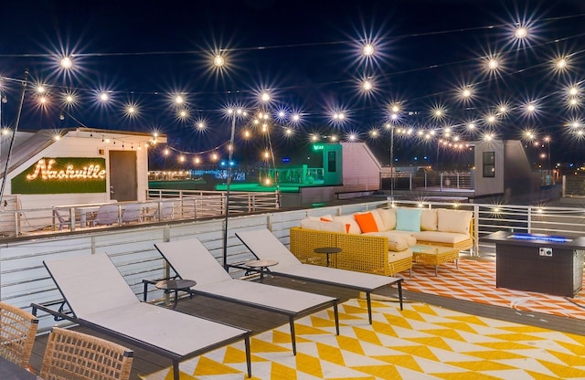 patio at twilight with outdoor lounge area