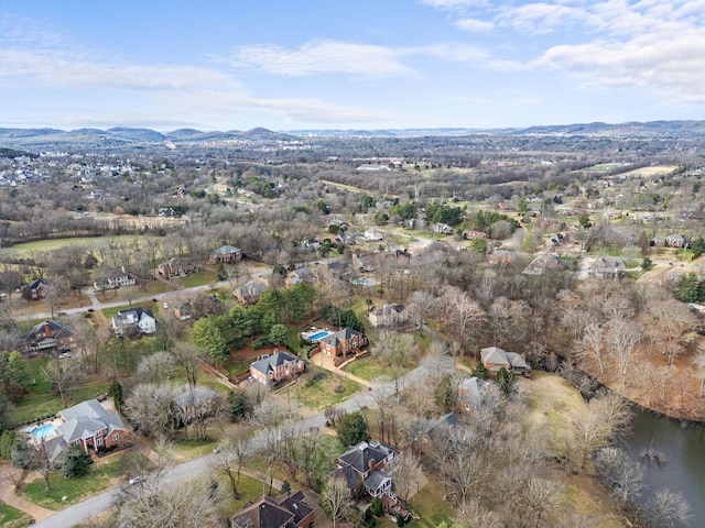 bird's eye view with a water and mountain view