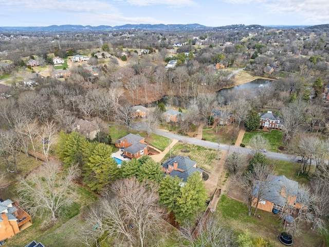 bird's eye view featuring a water and mountain view