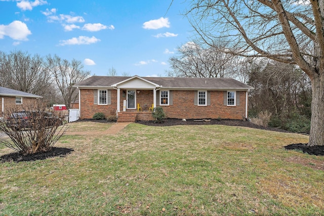 ranch-style house with a front lawn