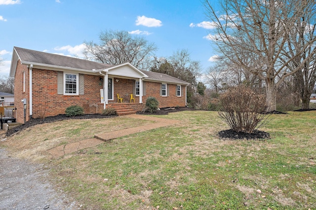 single story home with a front lawn