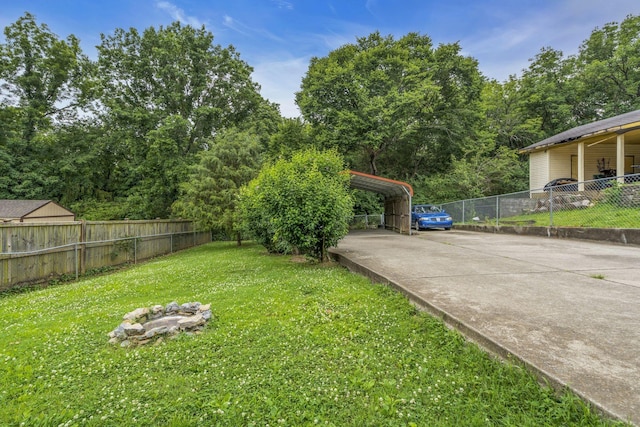 view of yard featuring a carport