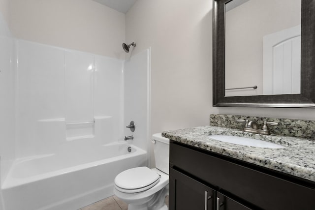 full bathroom featuring tile patterned flooring, vanity, shower / tub combination, and toilet